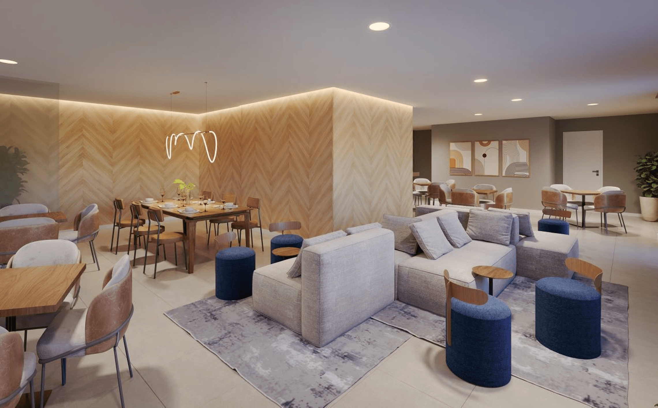 Área de estar e jantar integrada do condomínio com sofás, poltronas e mesas decoradas